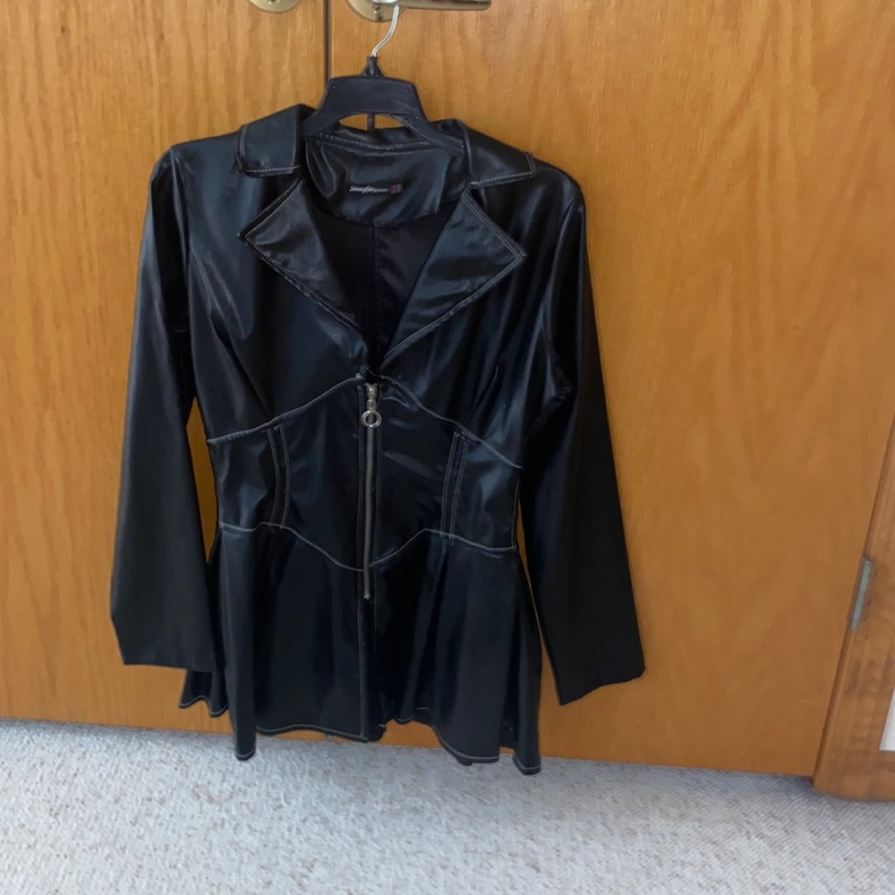 Black leather jacket with silver zipper with a corset like waist cut